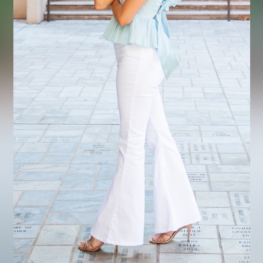 Chelsea and violet white flare jeans